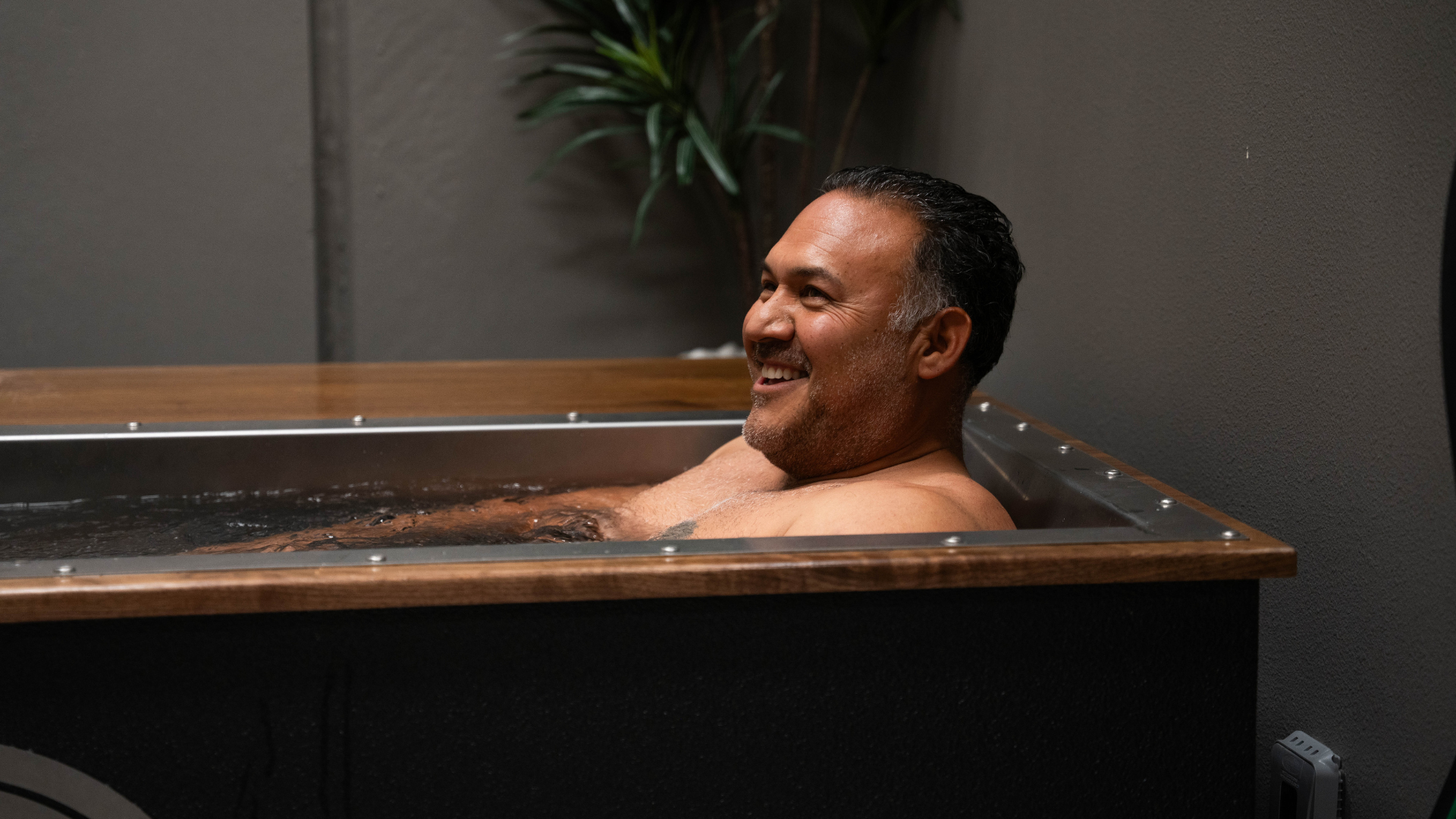 Member enjoying cold plunge recovery